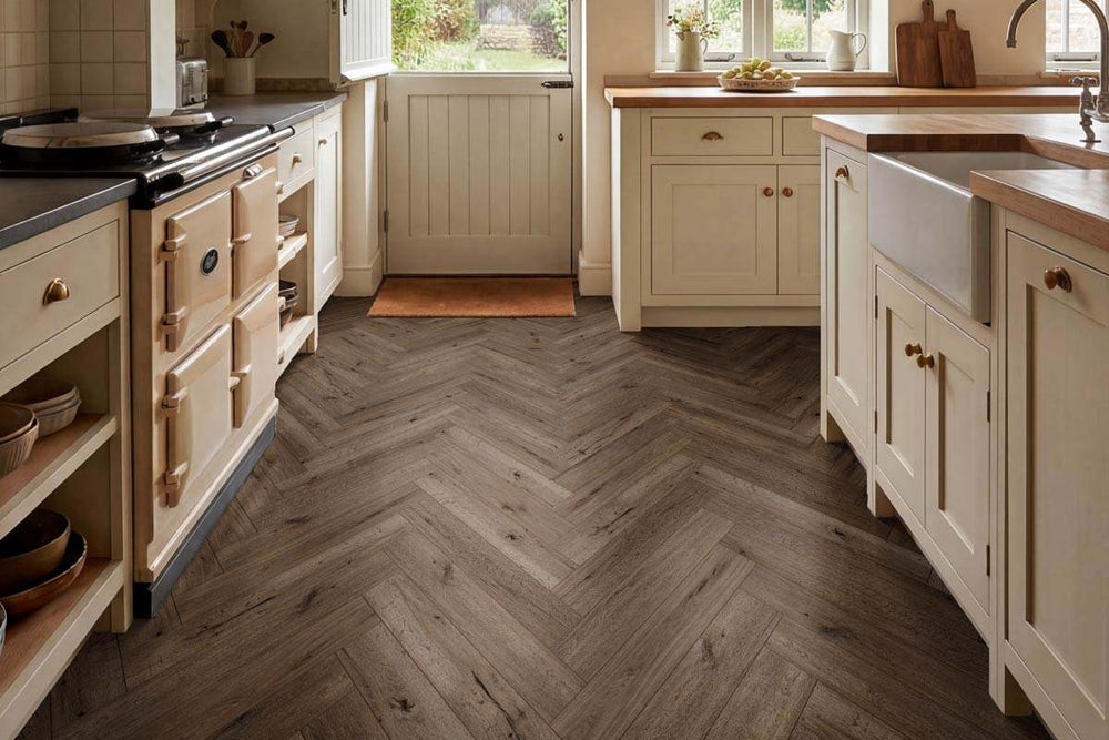 Audacity 12mm Laminate Herringbone Homestead Oak Built-in Underlay