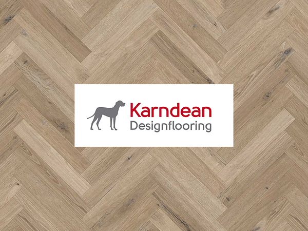 Karndean Designflooring logo on a luxury vinyl floor with a herringbone pattern