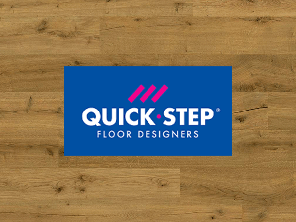 Quick-Step logo on a wooden floor background