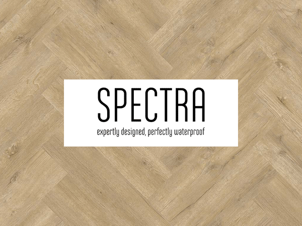 Spectra logo on a herringbone patterned  luxury vinyl floor